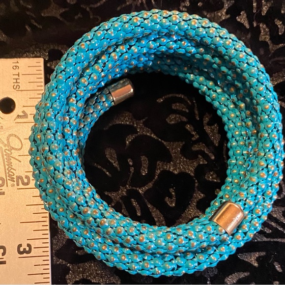 Turquoise and gold toned wrap bracelet fits most wrists 1 3/4” by 2 1/2” across - Picture 3 of 6